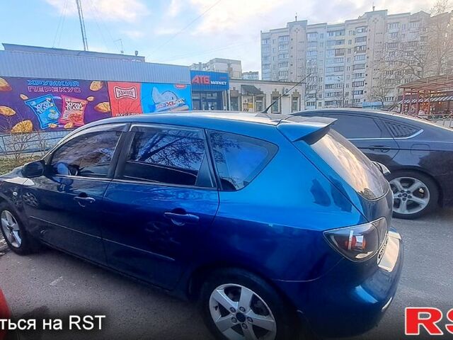 Синий Мазда 3, объемом двигателя 1.6 л и пробегом 210 тыс. км за 5300 $, фото 1 на Automoto.ua