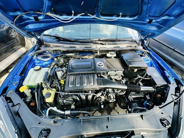 Синий Мазда 3, объемом двигателя 1.6 л и пробегом 192 тыс. км за 4500 $, фото 9 на Automoto.ua