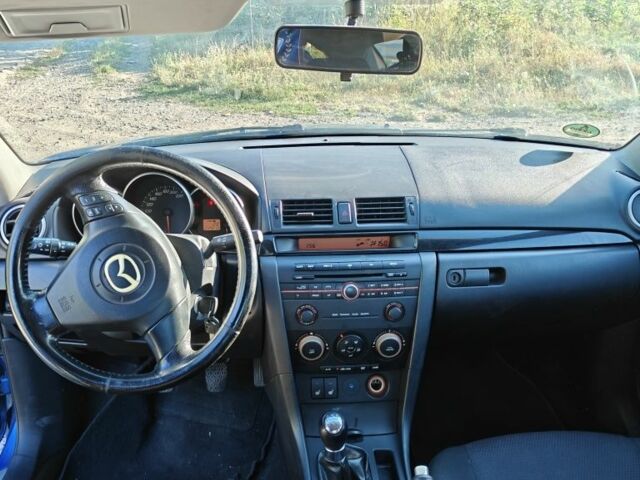 Синій Мазда 3, об'ємом двигуна 1.6 л та пробігом 217 тис. км за 3001 $, фото 3 на Automoto.ua