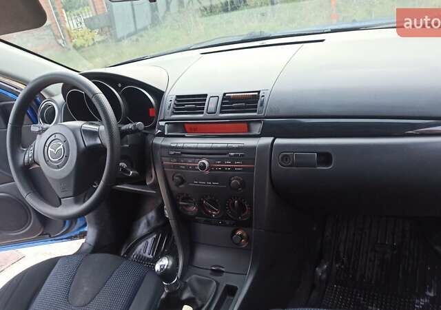 Синій Мазда 3, об'ємом двигуна 1.56 л та пробігом 358 тис. км за 3300 $, фото 3 на Automoto.ua