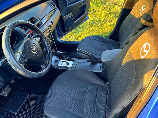 Синий Мазда 3, объемом двигателя 1.6 л и пробегом 265 тыс. км за 5000 $, фото 6 на Automoto.ua