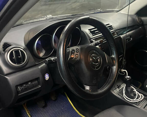 Синий Мазда 3, объемом двигателя 1.6 л и пробегом 255 тыс. км за 5000 $, фото 19 на Automoto.ua