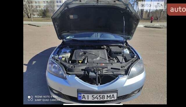 Синий Мазда 3, объемом двигателя 1.6 л и пробегом 172 тыс. км за 5800 $, фото 6 на Automoto.ua