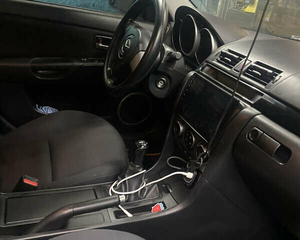 Синий Мазда 3, объемом двигателя 1.6 л и пробегом 255 тыс. км за 5000 $, фото 14 на Automoto.ua