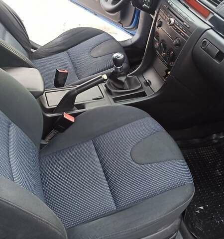 Синій Мазда 3, об'ємом двигуна 1.56 л та пробігом 358 тис. км за 3300 $, фото 8 на Automoto.ua