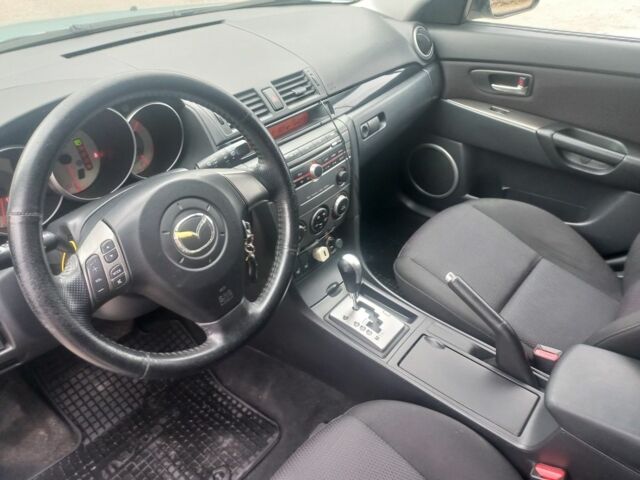 Синій Мазда 3, об'ємом двигуна 1.6 л та пробігом 203 тис. км за 5650 $, фото 4 на Automoto.ua