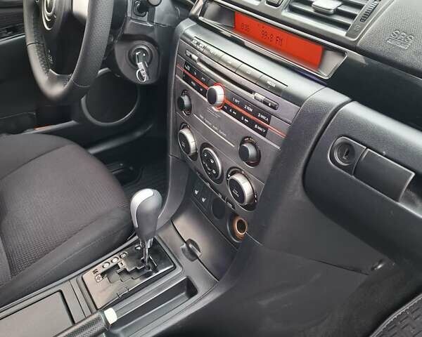 Синій Мазда 3, об'ємом двигуна 1.6 л та пробігом 230 тис. км за 5800 $, фото 12 на Automoto.ua