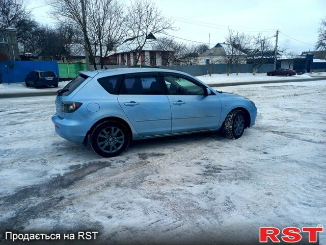 Синий Мазда 3, объемом двигателя 1.6 л и пробегом 20500 тыс. км за 5450 $, фото 6 на Automoto.ua