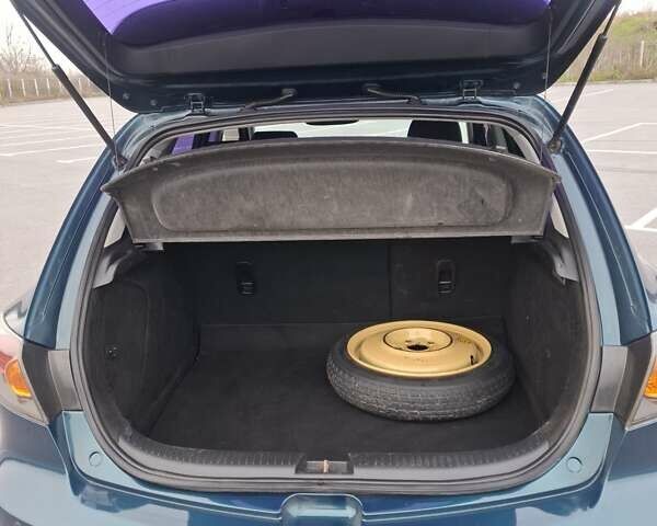 Синій Мазда 3, об'ємом двигуна 1.6 л та пробігом 230 тис. км за 5800 $, фото 13 на Automoto.ua