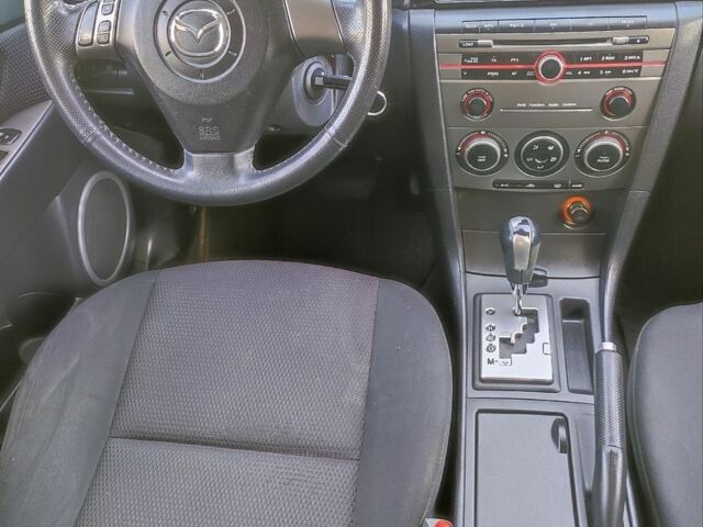 Синий Мазда 3, объемом двигателя 1.6 л и пробегом 240 тыс. км за 5900 $, фото 13 на Automoto.ua