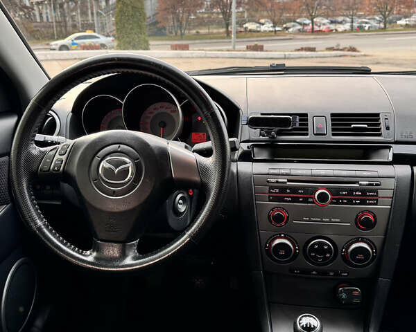Синий Мазда 3, объемом двигателя 1.6 л и пробегом 225 тыс. км за 4900 $, фото 12 на Automoto.ua
