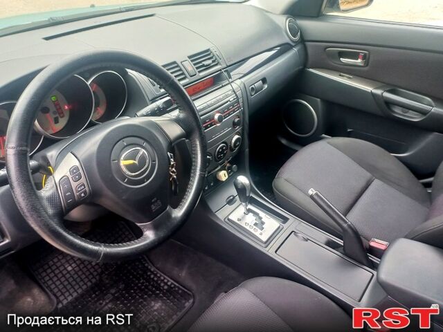 Синий Мазда 3, объемом двигателя 1.6 л и пробегом 203 тыс. км за 5650 $, фото 7 на Automoto.ua