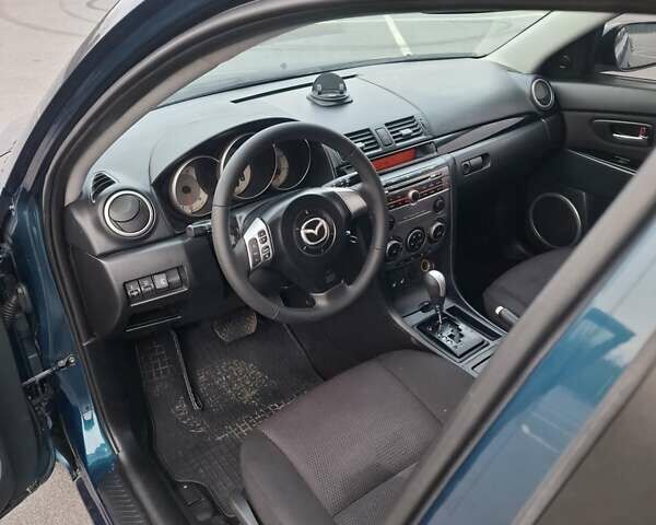 Синій Мазда 3, об'ємом двигуна 1.6 л та пробігом 230 тис. км за 5800 $, фото 14 на Automoto.ua