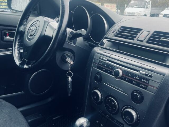 Синий Мазда 3, объемом двигателя 1.6 л и пробегом 264 тыс. км за 5200 $, фото 6 на Automoto.ua