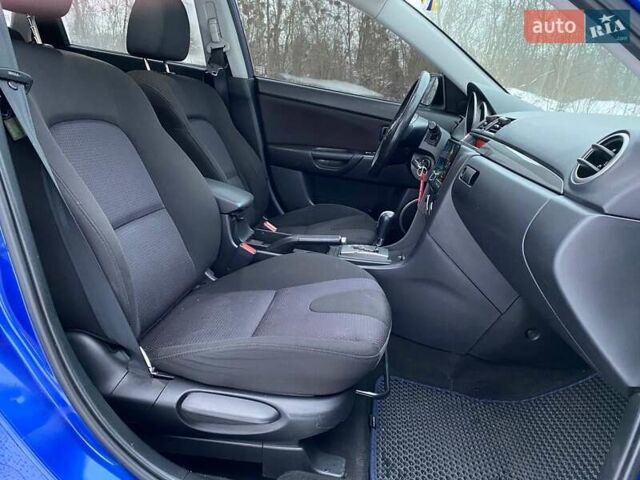Синій Мазда 3, об'ємом двигуна 2.3 л та пробігом 216 тис. км за 5700 $, фото 7 на Automoto.ua