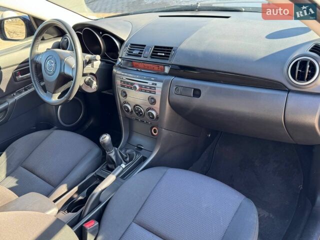 Синий Мазда 3, объемом двигателя 1.6 л и пробегом 191 тыс. км за 5299 $, фото 62 на Automoto.ua