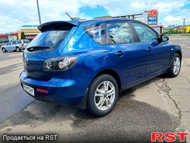 Синій Мазда 3, об'ємом двигуна 2 л та пробігом 245 тис. км за 5250 $, фото 4 на Automoto.ua
