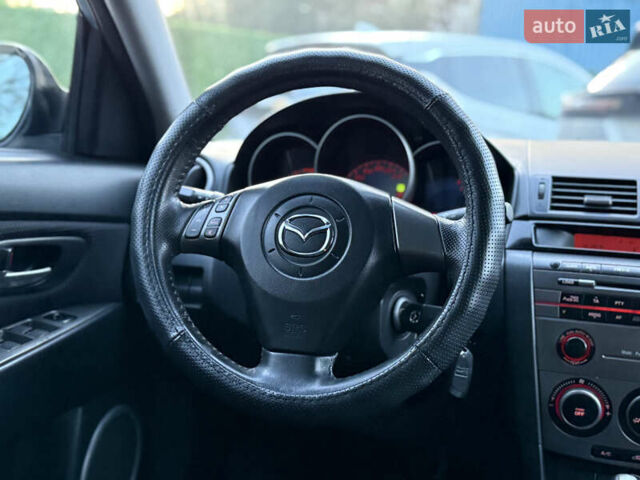 Синий Мазда 3, объемом двигателя 1.6 л и пробегом 206 тыс. км за 5900 $, фото 48 на Automoto.ua