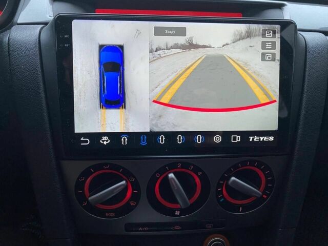 Синій Мазда 3, об'ємом двигуна 2.3 л та пробігом 216 тис. км за 5700 $, фото 7 на Automoto.ua