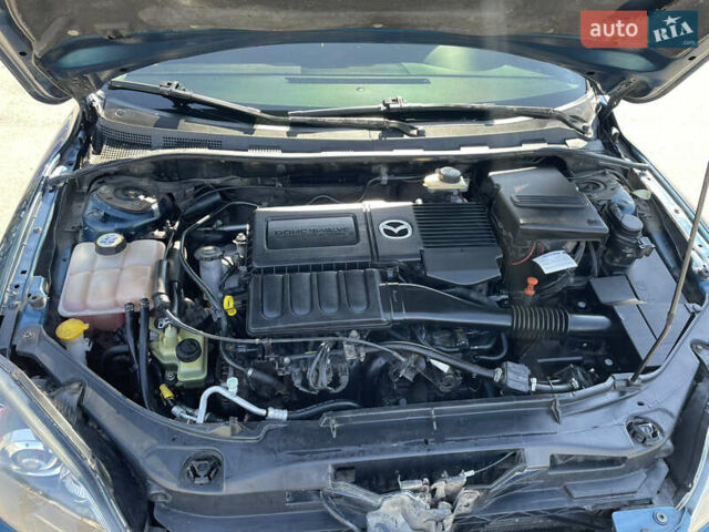Синій Мазда 3, об'ємом двигуна 1.6 л та пробігом 176 тис. км за 6299 $, фото 17 на Automoto.ua