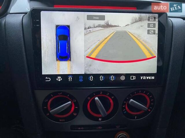 Синій Мазда 3, об'ємом двигуна 2.3 л та пробігом 216 тис. км за 5700 $, фото 8 на Automoto.ua