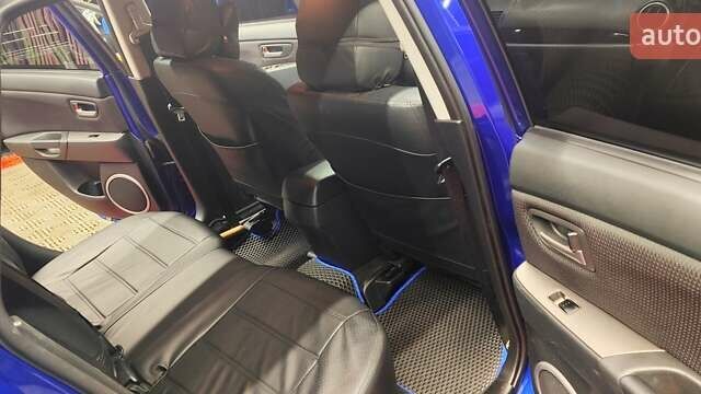 Синій Мазда 3, об'ємом двигуна 1.35 л та пробігом 220 тис. км за 4500 $, фото 14 на Automoto.ua