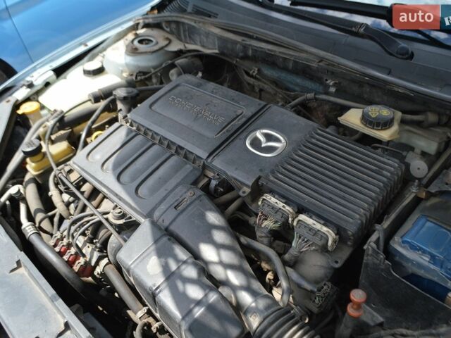 Синій Мазда 3, об'ємом двигуна 1.6 л та пробігом 235 тис. км за 4900 $, фото 22 на Automoto.ua