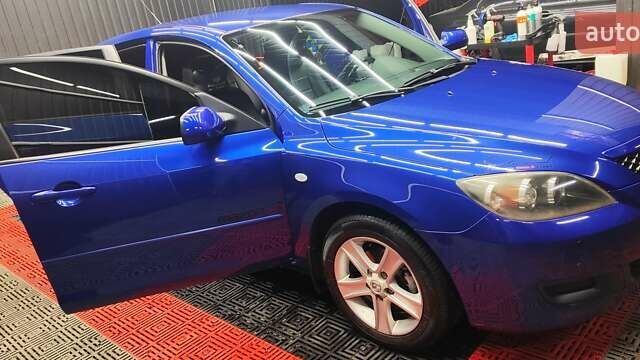 Синій Мазда 3, об'ємом двигуна 1.35 л та пробігом 220 тис. км за 4500 $, фото 9 на Automoto.ua