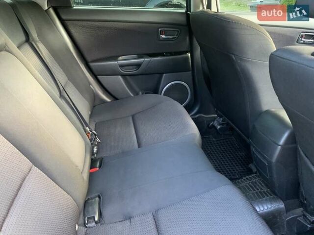 Синий Мазда 3, объемом двигателя 1.5 л и пробегом 228 тыс. км за 5500 $, фото 9 на Automoto.ua