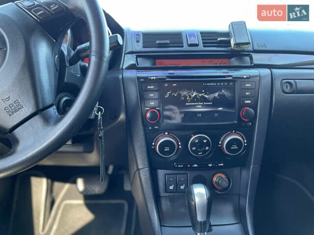 Синій Мазда 3, об'ємом двигуна 1.6 л та пробігом 176 тис. км за 6299 $, фото 11 на Automoto.ua