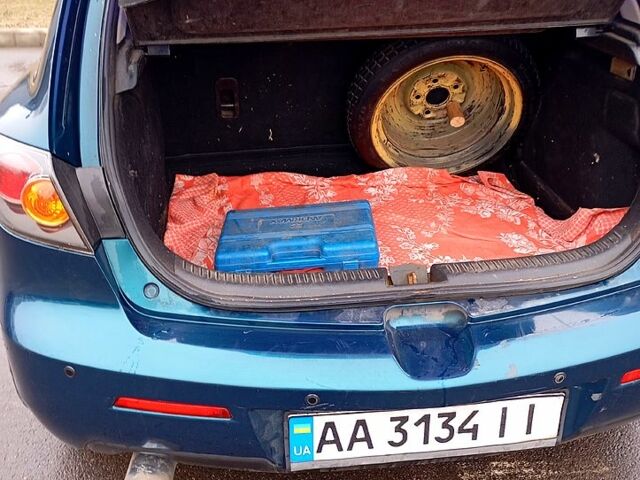 Синий Мазда 3, объемом двигателя 1.6 л и пробегом 210 тыс. км за 4800 $, фото 4 на Automoto.ua