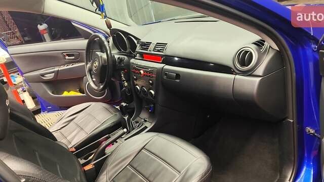 Синій Мазда 3, об'ємом двигуна 1.35 л та пробігом 220 тис. км за 4500 $, фото 13 на Automoto.ua