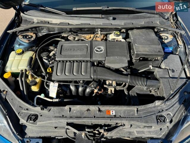 Синий Мазда 3, объемом двигателя 1.6 л и пробегом 191 тыс. км за 5299 $, фото 40 на Automoto.ua