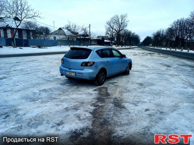 Синий Мазда 3, объемом двигателя 1.6 л и пробегом 20500 тыс. км за 5450 $, фото 4 на Automoto.ua