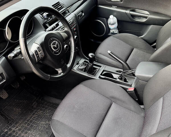 Синий Мазда 3, объемом двигателя 1.6 л и пробегом 225 тыс. км за 4900 $, фото 8 на Automoto.ua