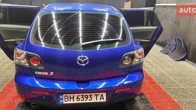 Синій Мазда 3, об'ємом двигуна 1.35 л та пробігом 220 тис. км за 4500 $, фото 11 на Automoto.ua