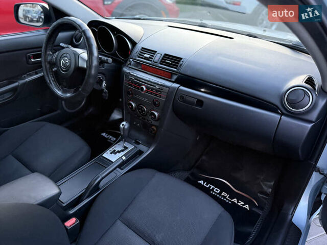 Синий Мазда 3, объемом двигателя 1.6 л и пробегом 206 тыс. км за 5900 $, фото 43 на Automoto.ua