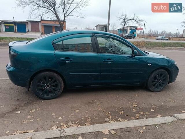 Синий Мазда 3, объемом двигателя 1.6 л и пробегом 286 тыс. км за 4600 $, фото 4 на Automoto.ua