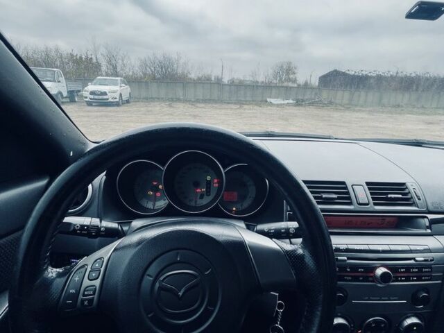 Синий Мазда 3, объемом двигателя 1.6 л и пробегом 264 тыс. км за 5200 $, фото 7 на Automoto.ua