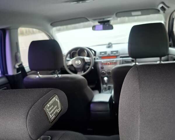 Синій Мазда 3, об'ємом двигуна 1.6 л та пробігом 230 тис. км за 5800 $, фото 18 на Automoto.ua