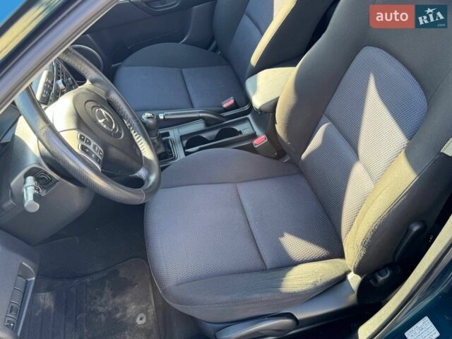 Синий Мазда 3, объемом двигателя 1.6 л и пробегом 191 тыс. км за 5299 $, фото 48 на Automoto.ua