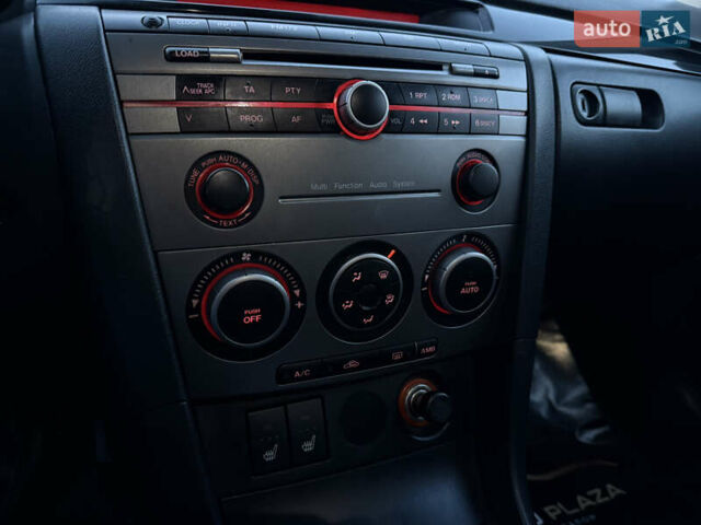 Синий Мазда 3, объемом двигателя 1.6 л и пробегом 206 тыс. км за 5900 $, фото 49 на Automoto.ua