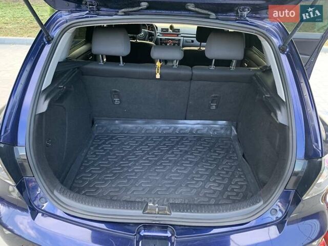 Синий Мазда 3, объемом двигателя 1.5 л и пробегом 228 тыс. км за 5500 $, фото 16 на Automoto.ua