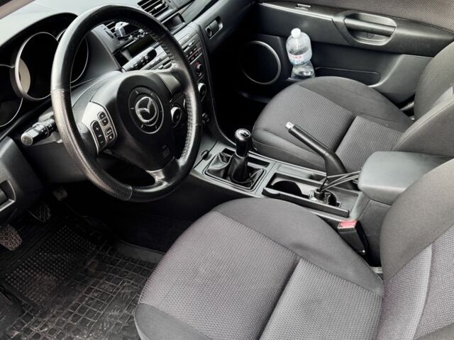 Синий Мазда 3, объемом двигателя 1.6 л и пробегом 205 тыс. км за 4900 $, фото 8 на Automoto.ua