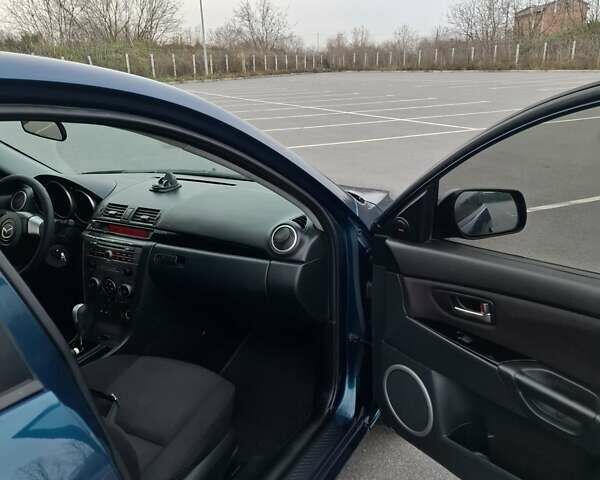 Синій Мазда 3, об'ємом двигуна 1.6 л та пробігом 230 тис. км за 5800 $, фото 11 на Automoto.ua