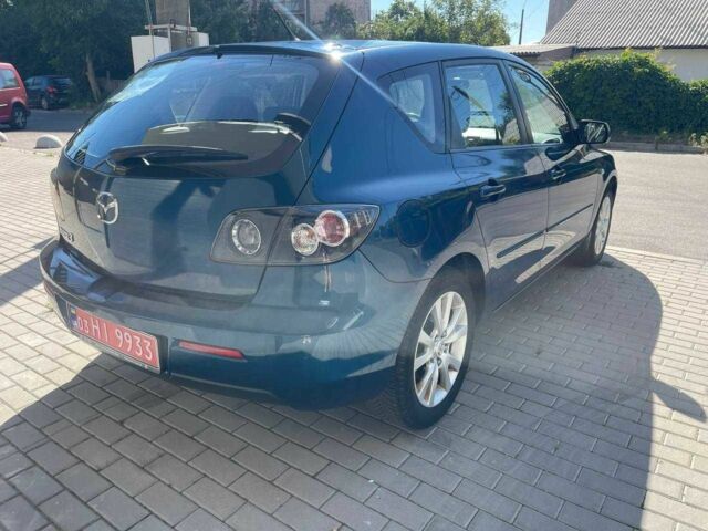 Синій Мазда 3, об'ємом двигуна 1.6 л та пробігом 190 тис. км за 5499 $, фото 4 на Automoto.ua