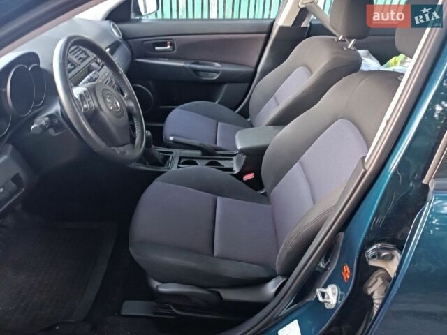 Синий Мазда 3, объемом двигателя 1.6 л и пробегом 191 тыс. км за 5299 $, фото 77 на Automoto.ua