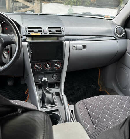 Синій Мазда 3, об'ємом двигуна 1.6 л та пробігом 416 тис. км за 3300 $, фото 7 на Automoto.ua