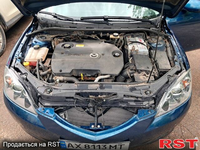 Синій Мазда 3, об'ємом двигуна 2 л та пробігом 245 тис. км за 5250 $, фото 12 на Automoto.ua