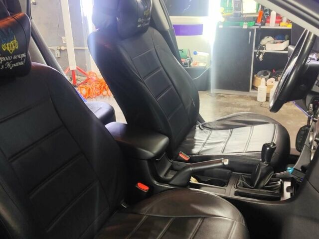Синий Мазда 3, объемом двигателя 1.35 л и пробегом 220 тыс. км за 5000 $, фото 7 на Automoto.ua